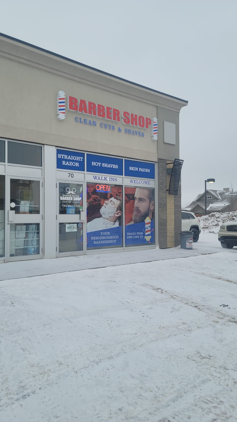 Storefront winter at The Ridge Barbershop